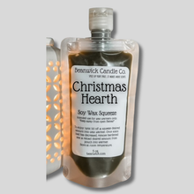 Load image into Gallery viewer, a bottle of christmas flearth sitting on top of a shelf