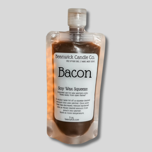 a bottle of bacon sitting on top of a table