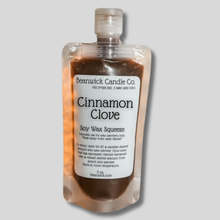 Load image into Gallery viewer, a close up of a bottle of cinnamon clove