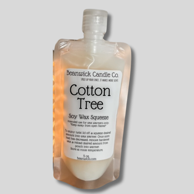 a bottle of cotton tree soap on a gray background