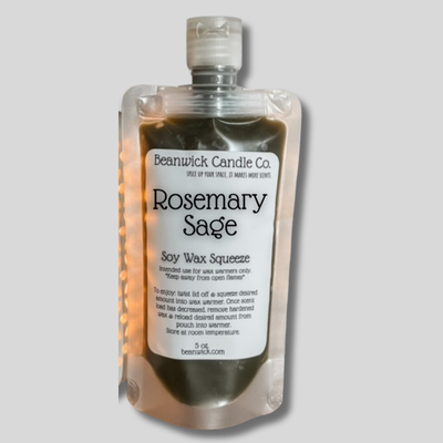 a bottle of rosemary sage on a gray background