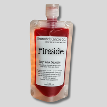 Load image into Gallery viewer, a bottle of fireside on a gray background