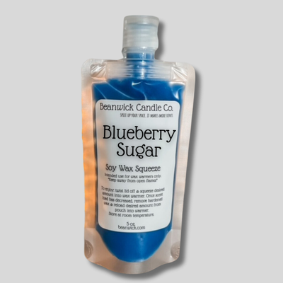 a bottle of blueberry sugar on a gray background