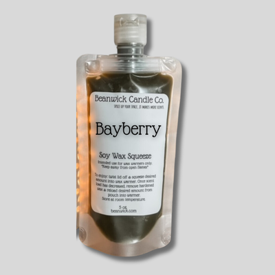 a bottle of bayberry soap on a gray background