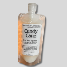 Load image into Gallery viewer, a bottle of candy cane soap on a gray background