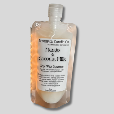 a bottle of mango and coconut milk