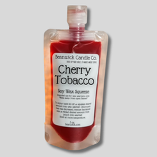 Load image into Gallery viewer, a bottle of cherry tobacco sitting on a table