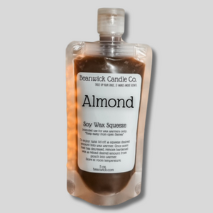 a bottle of almond flavored liquid