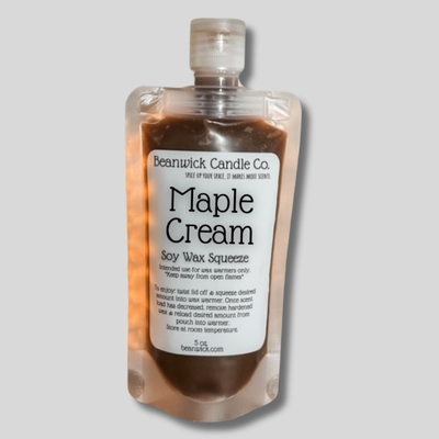 a bottle of maple cream on a gray background