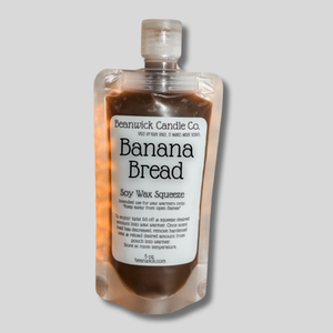 a bottle of banana bread on a gray background