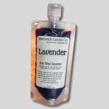 Load image into Gallery viewer, a bottle of lavender soap sitting on top of a table