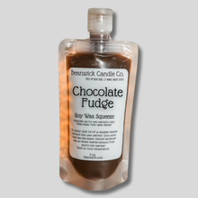 Load image into Gallery viewer, a bottle of chocolate fudge on a gray background