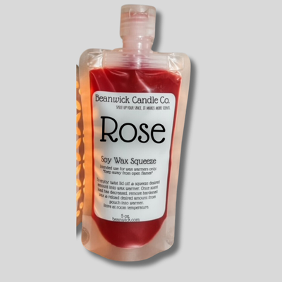 a close up of a bottle of rose soap