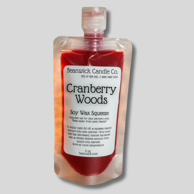 a bottle of cranberry woods syrup